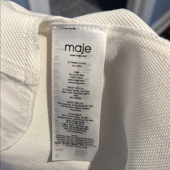 Elegant White Sleeveless Dress - Picture 5 of 5